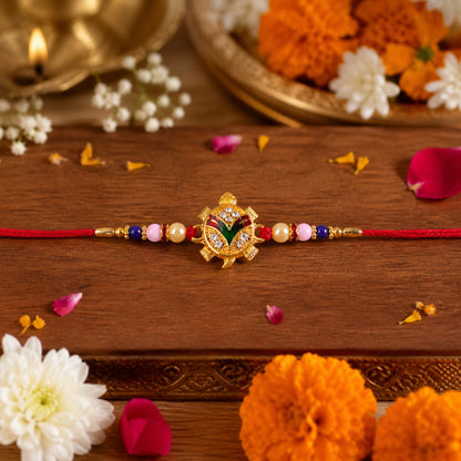Detailed view of Tortoise Charm on Rakhi thread
