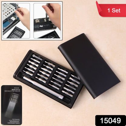 Precision screwdriver set with various interchangeable bits laid out