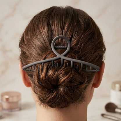 Matte finish hair claw clip holding thick hair