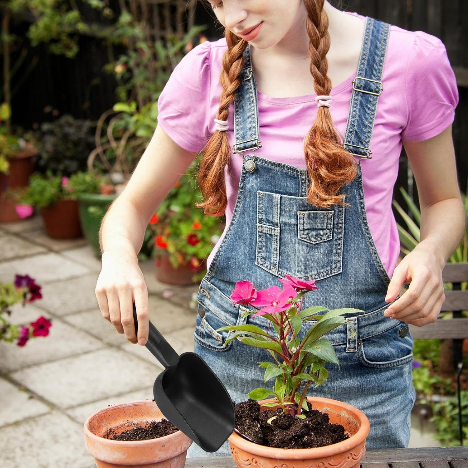 Plastic planting and digging tool