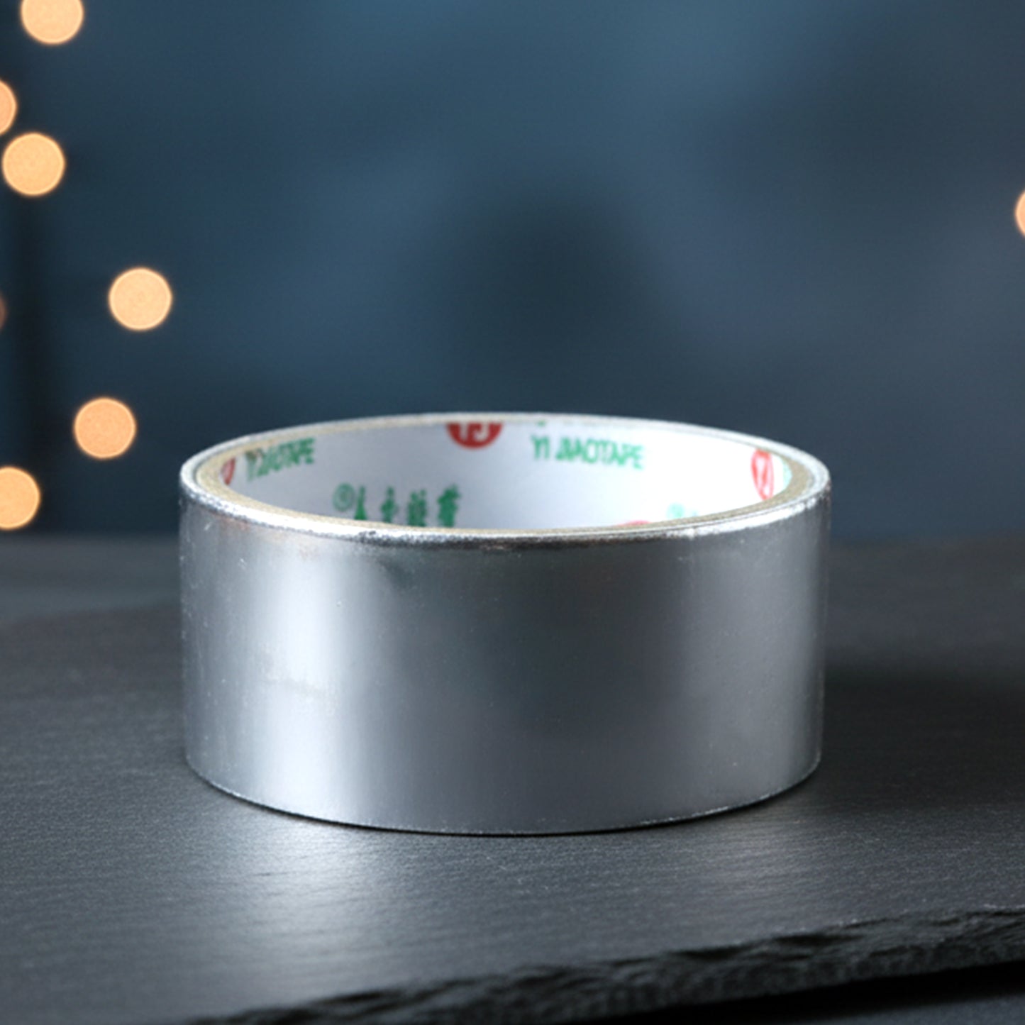 Applying aluminium foil tape on surface