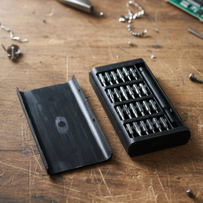 Small precision screwdriver with bits
