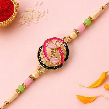 Black and Pink Enamel Spiral Pendant Rakhi with Pastel Beads