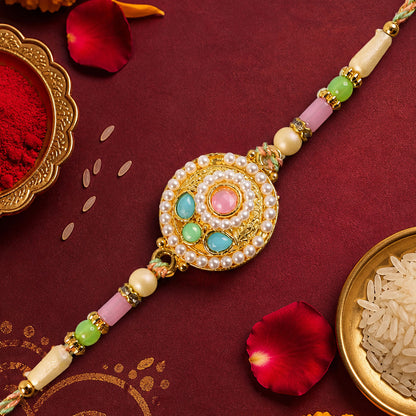 Pearl Bordered Round Pendant Rakhi with Turquoise and Pink Center