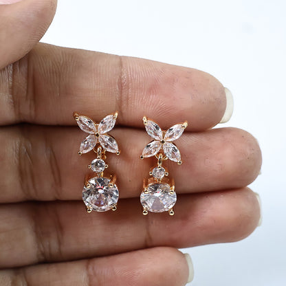 Floral CZ diamond drop earrings styled with traditional attire