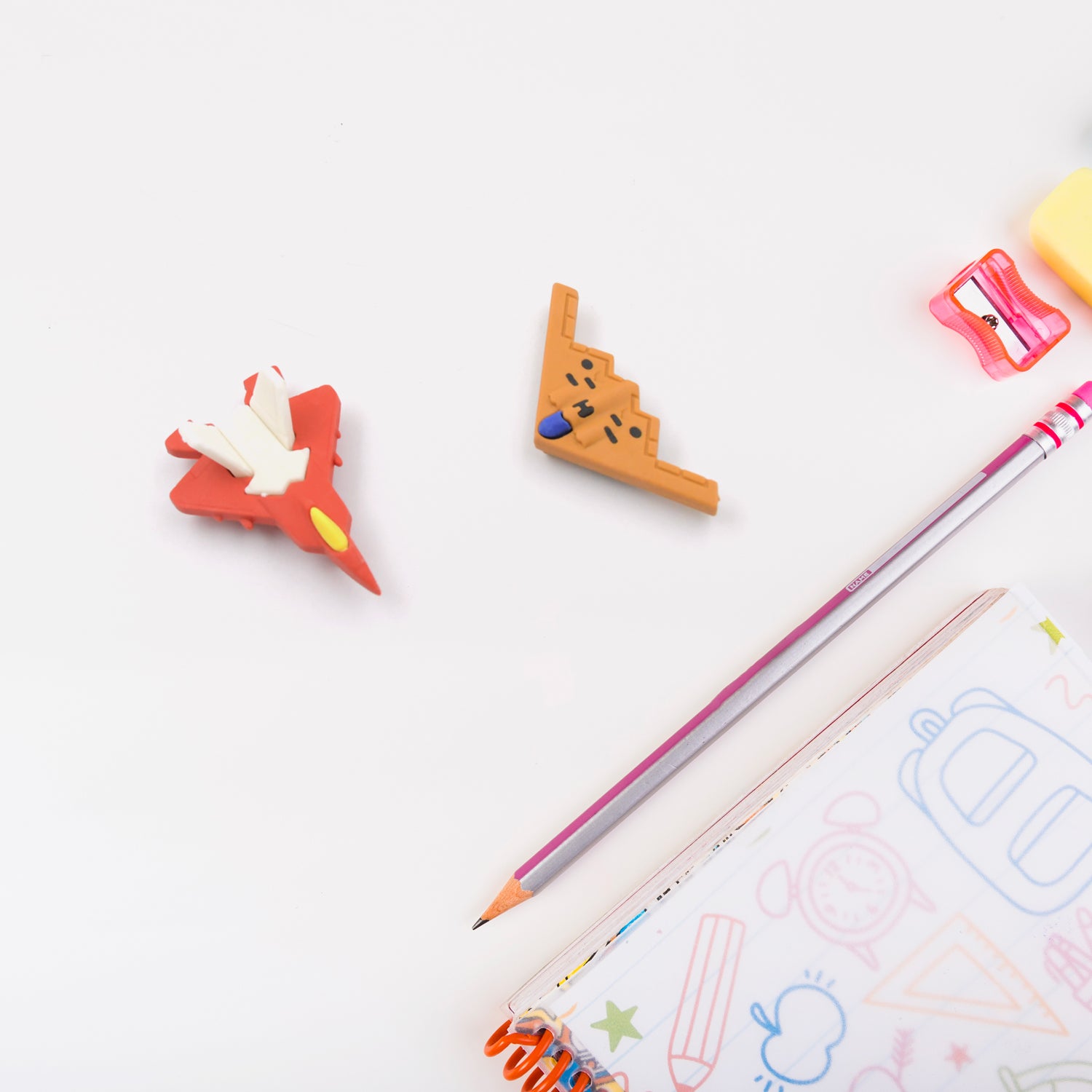 Pack of fun erasers in gun and plane shapes for kids