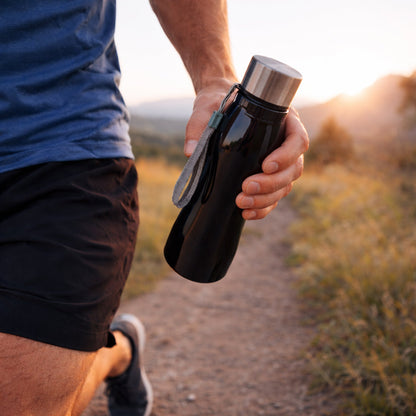 Stainless steel water bottle with carry strap side view