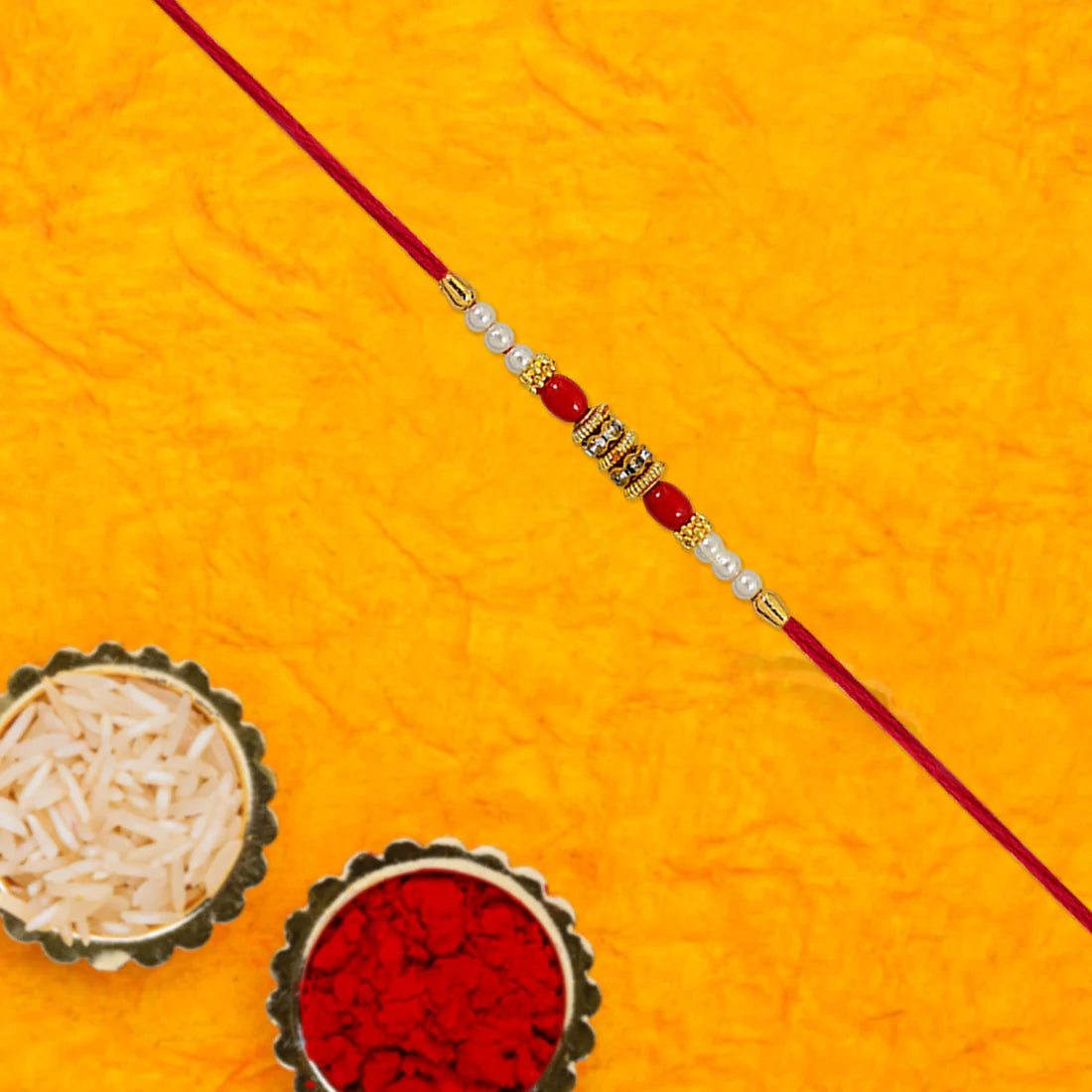 Pearl Beaded Rakhi – Traditional Red & Gold Elegance