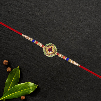 Designer Stone Rakhi with Red Centerpiece, Pearl Beads & Colorful Detailing – Elegant Thread for Raksha Bandhan
