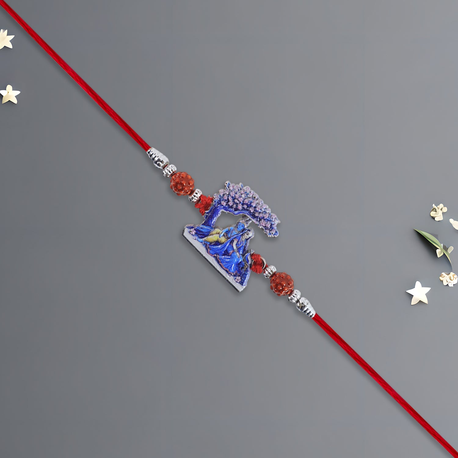 Radha Krishna Rakhi under Tree Design with Rudraksha & Red Mauli Thread