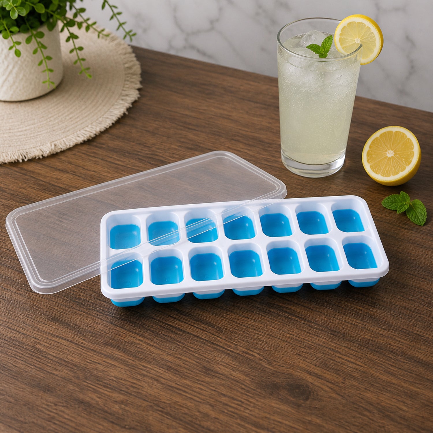 Ice cube tray filled with water on kitchen countertop