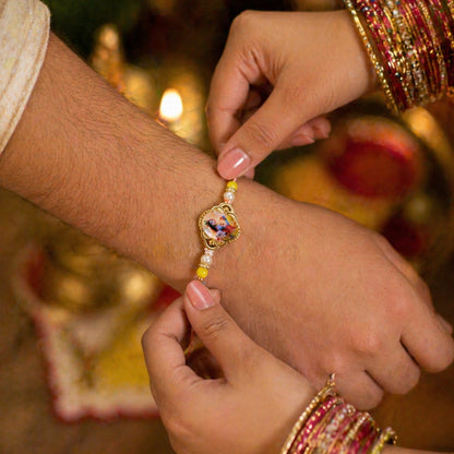 Closeup of decorative beads on Lord Krishna Rakhi