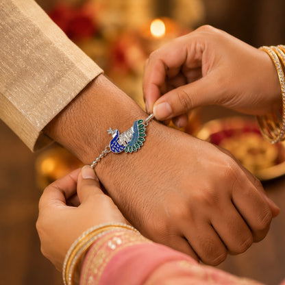 Traditional Rakhi with silver peacock design and beads