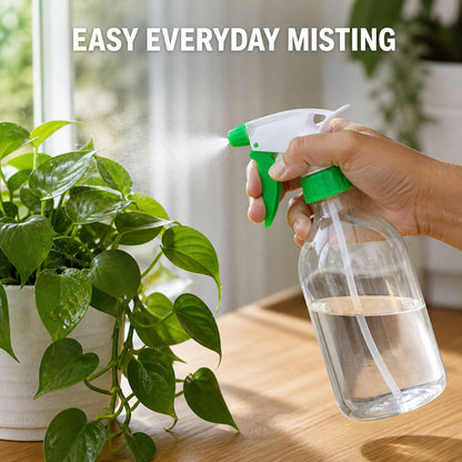 A hand holds a green and white trigger sprayer nozzle on a clear bottle, misting a green plant, with 'EASY EVERYDAY MISTING'