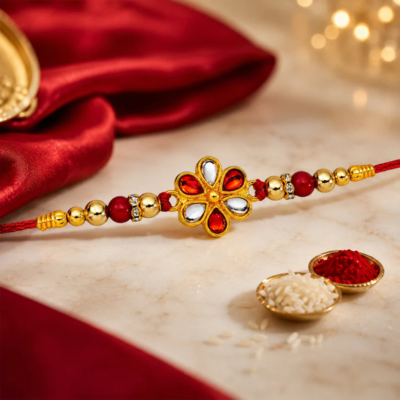 Floral Rakhi displayed from another angle, highlighting its vibrant colours.