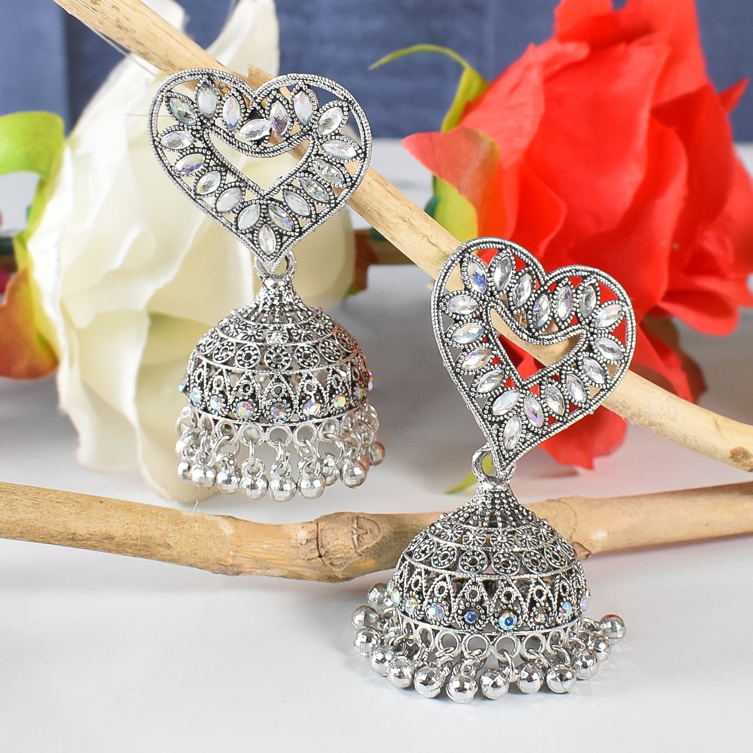 Heart-Shaped White-Coloured Jhumka Earrings with Diamond Detailing