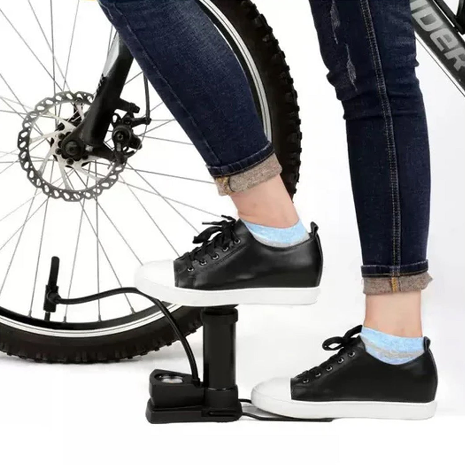 Manual foot air pump with hose attached