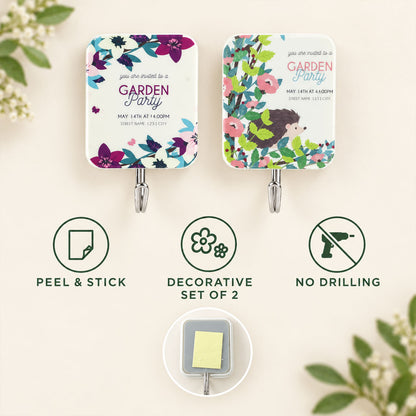 Two decorative sticky hooks with floral and hedgehog designs, surrounded by icons illustrating peel-and-stick application.