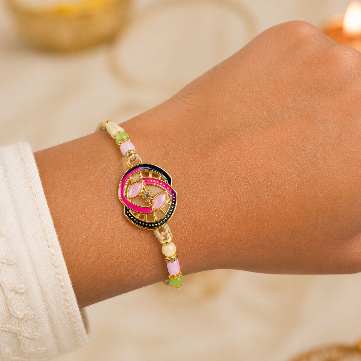 Black and Pink Enamel Spiral Pendant Rakhi with Pastel Beads