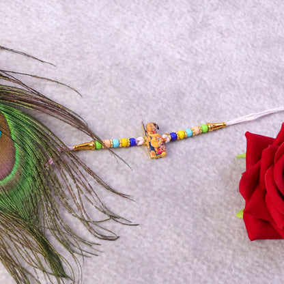 Close-up of colorful designer beads on Hanuman Ji Rakhi