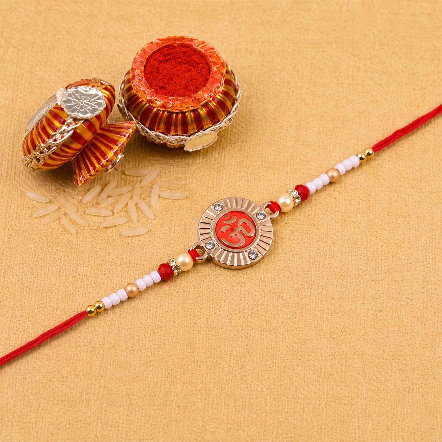 Om Round Charm Rakhi with Pearl Beads for Brothers (5pcs)