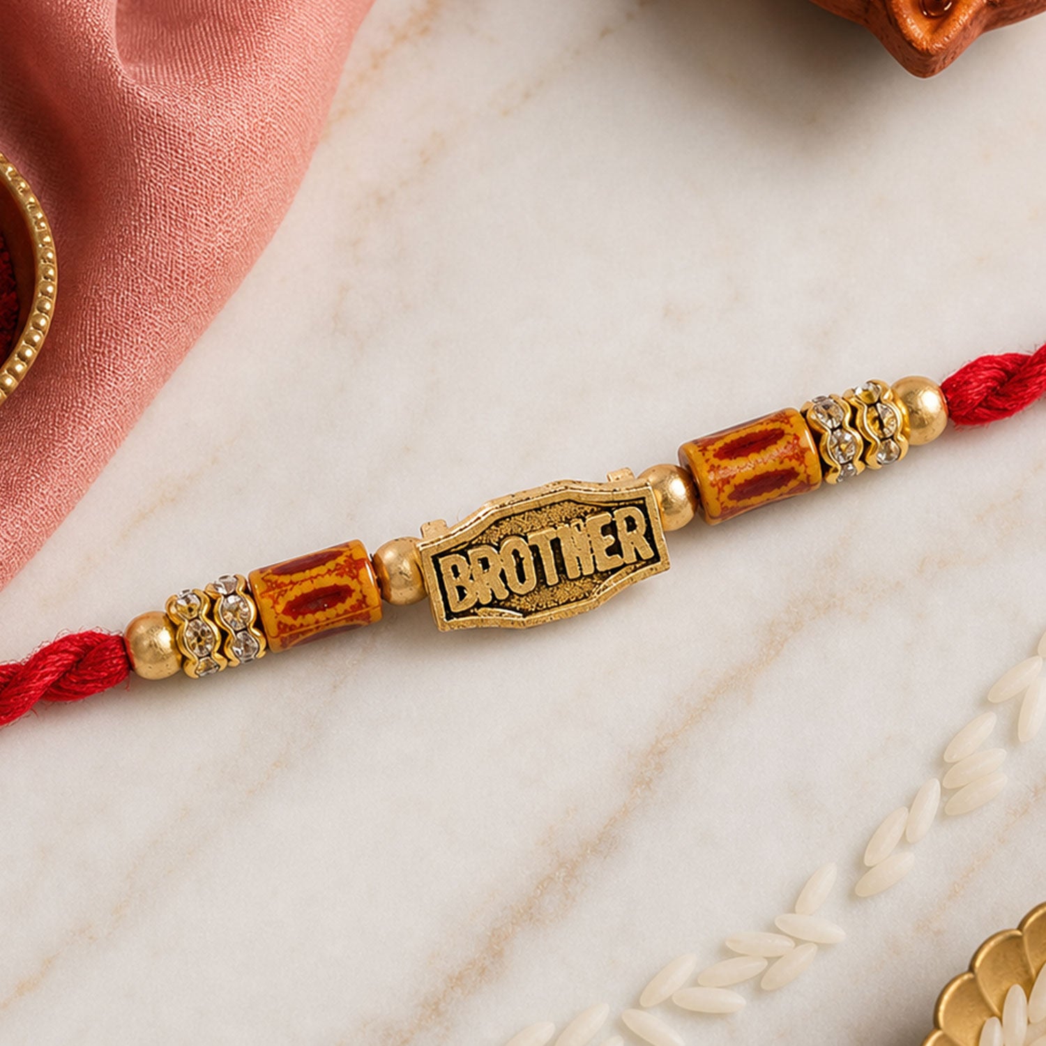 Red Thread Rakhi with Wooden Beads and a Personalised 'Brother' Charm