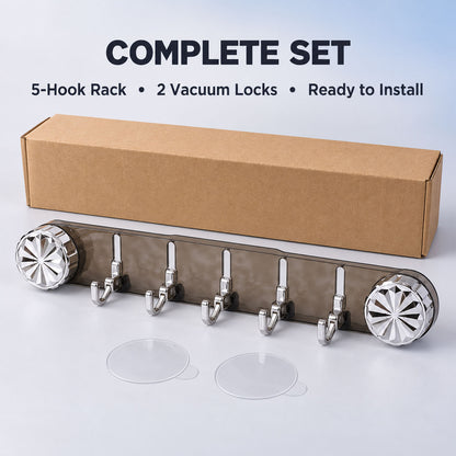 A complete set of the gray transparent wall rack with five silver folding hooks, two clear suction cups, and a brown