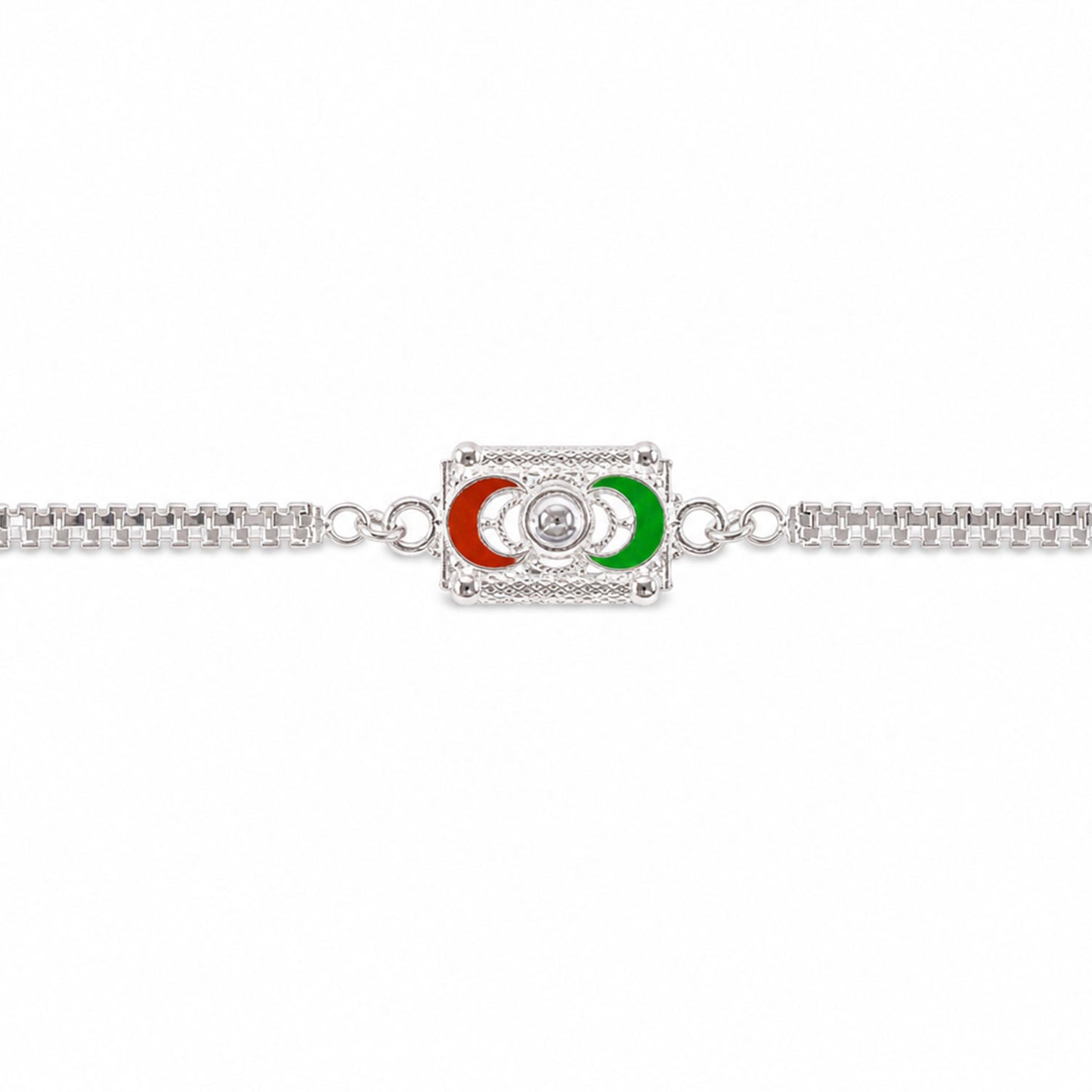 A silver-colored bracelet with a rectangular centerpiece featuring red and green crescent moon shapes, centered against a