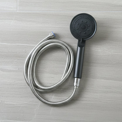 Flexible stainless steel hose connected to shower handle