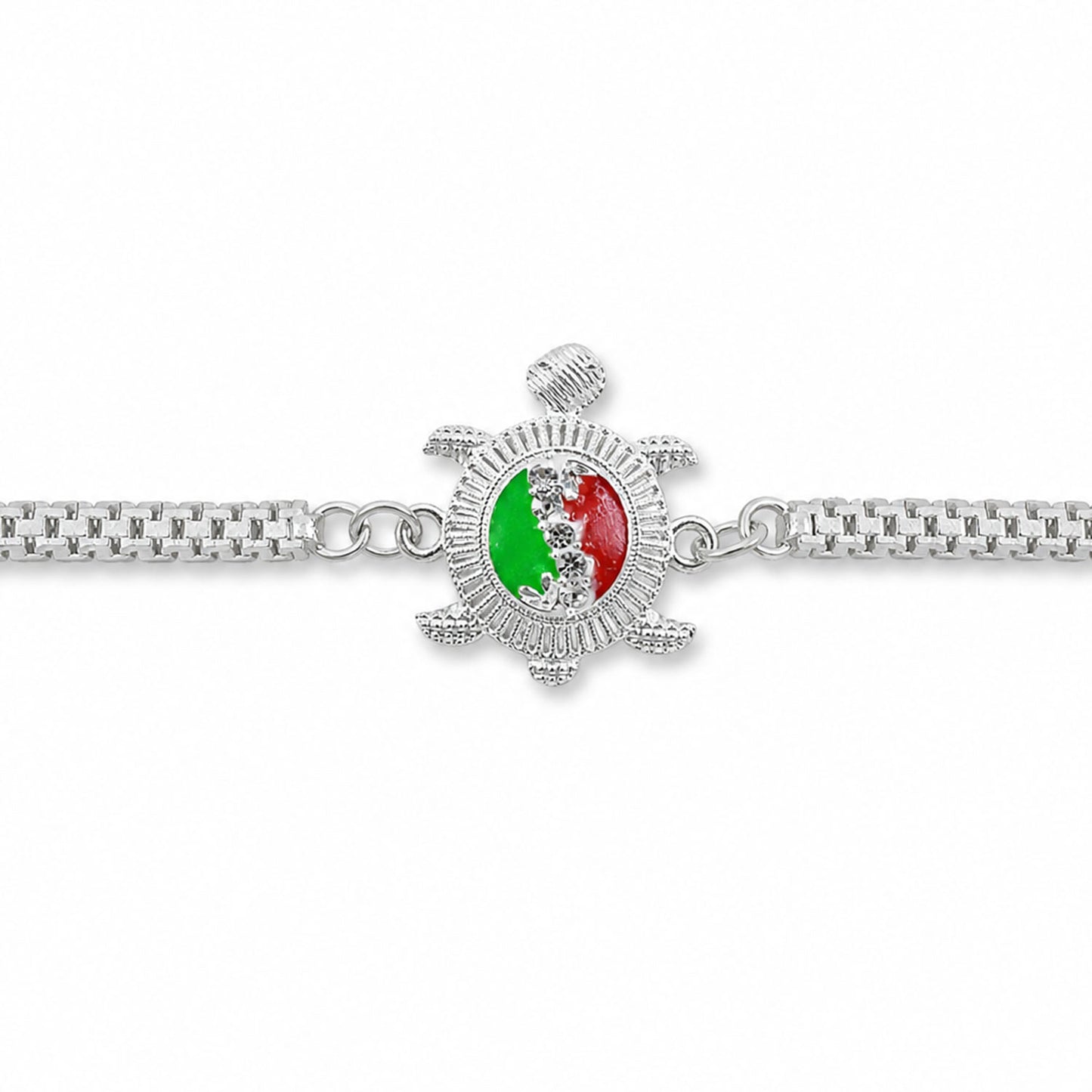 The silver Turtle Rakhi on a festive backdrop, ready for Raksha Bandhan gifting.