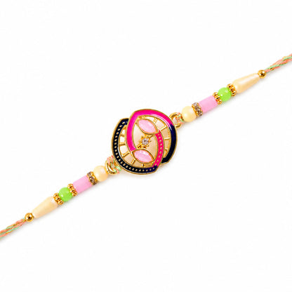 Black and Pink Enamel Spiral Pendant Rakhi with Pastel Beads