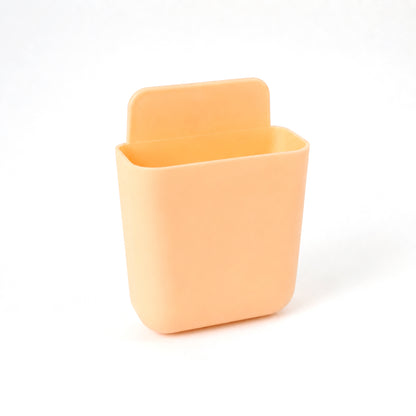 Wall-Mounted Storage Pocket filled with small essentials