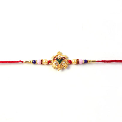 Side view of Tortoise Charm Rakhi showing intricate design