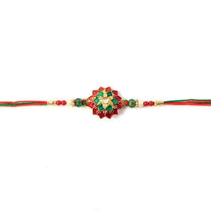 Elaborate Layered Lotus Rakhi Embellished in Red-Green Enamel and a Crystal Core