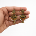 Doll Jhumka Earrings – Elegant Gold Finish Tribal Design