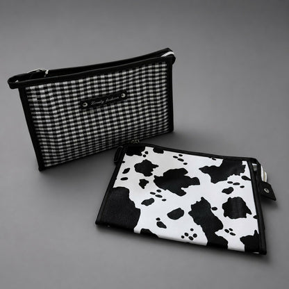 Makeup and stationery organized inside zipper pouch