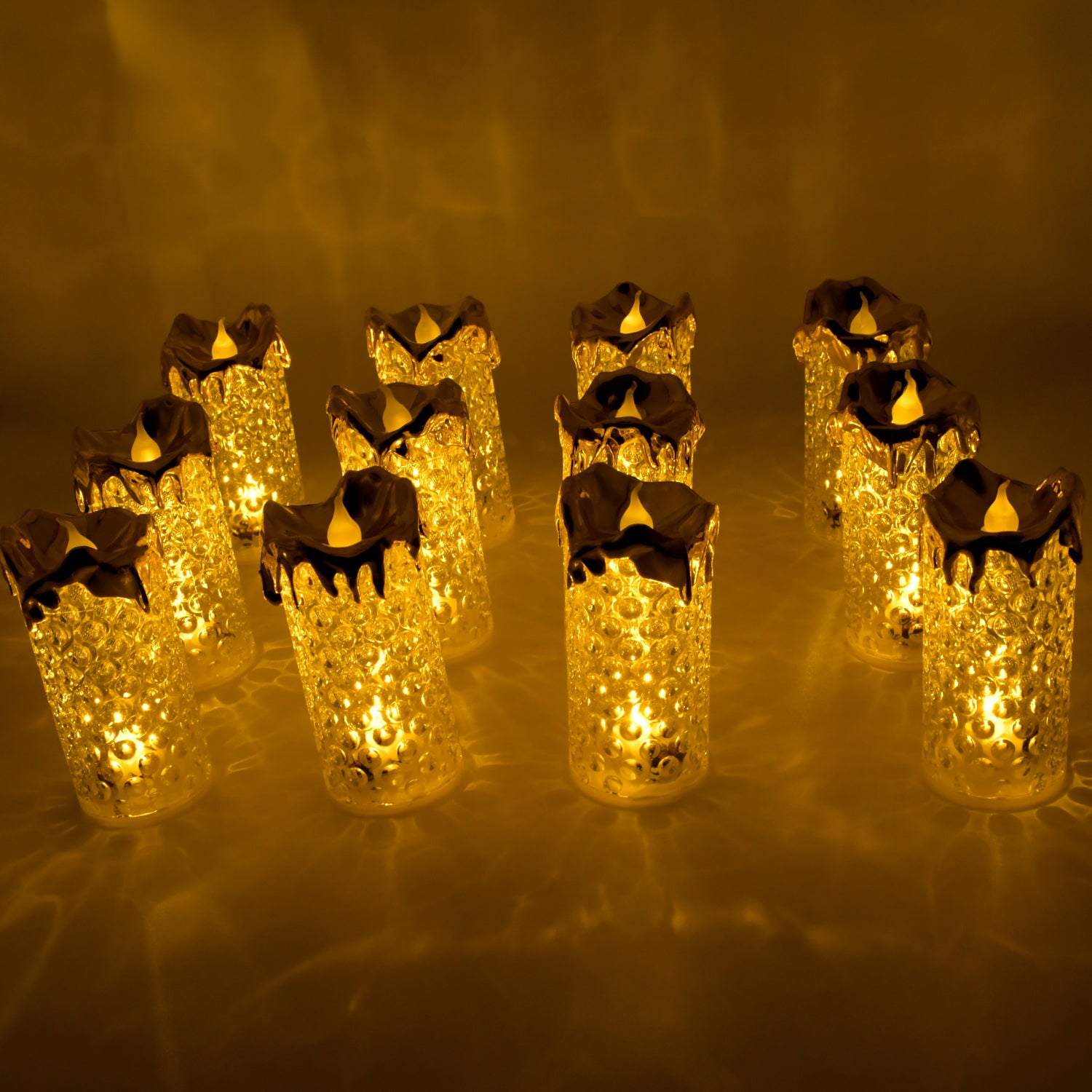 Gold LED candles with a realistic flame effect, ideal for creating a cozy atmosphere during the holidays.