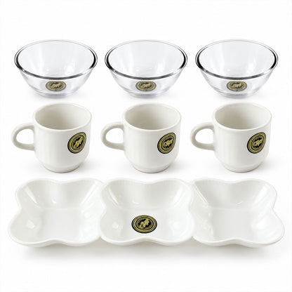 A clean, top-down view of the seven-piece serving set on a white background, featuring three white ceramic mugs, three clear
