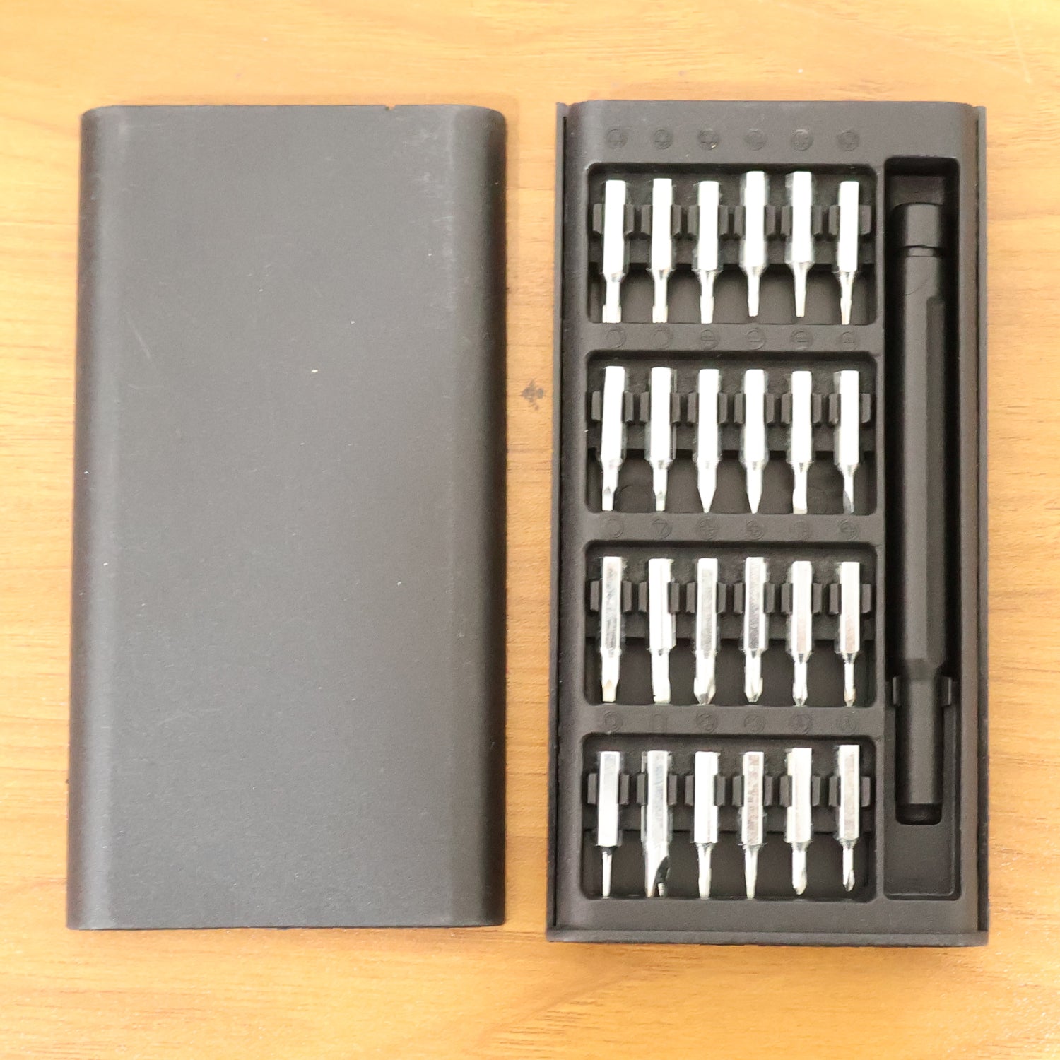 Interchangeable screwdriver bits in case
