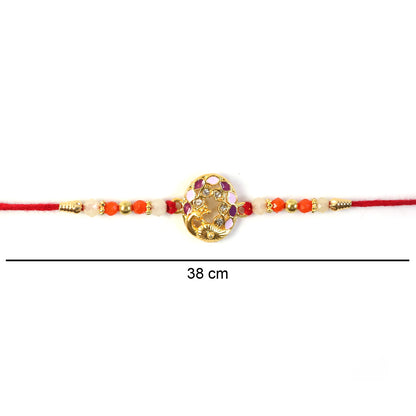 Peacock motif rakhi detailed with multicolor beads and comfortable thread