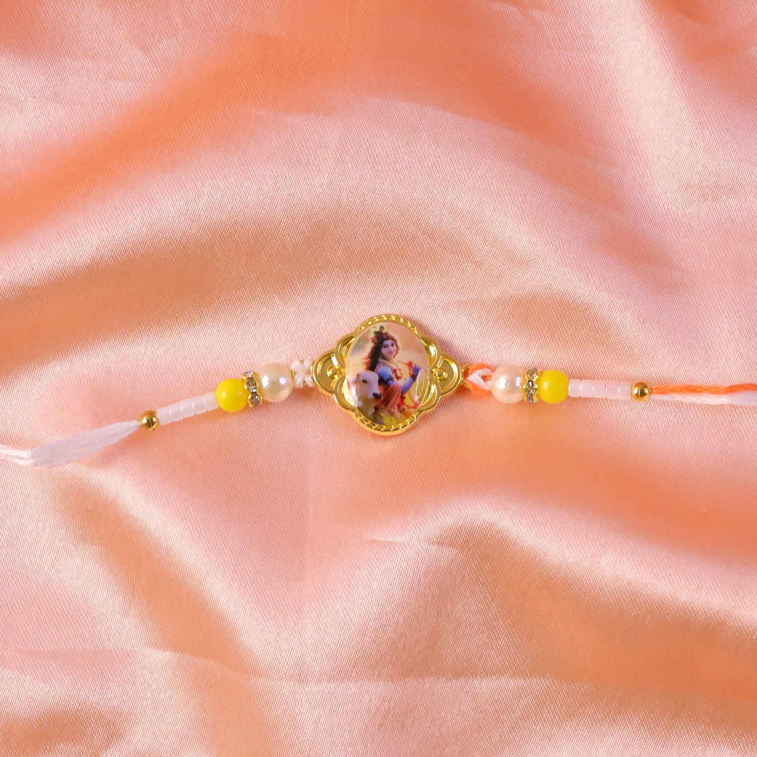 Traditional rakhi knot and thread detail