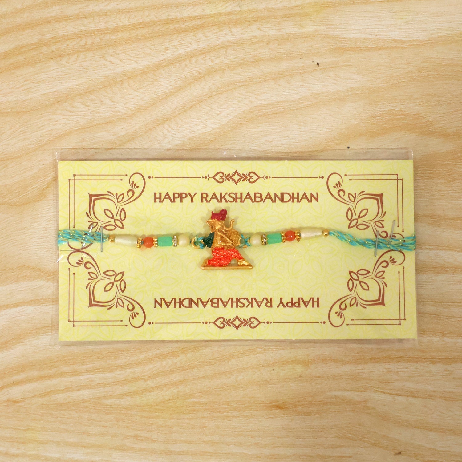 Ganesh Charms Rakhi with Turquoise and Pearl Beads Elegant Festival Accessory (10pcs)