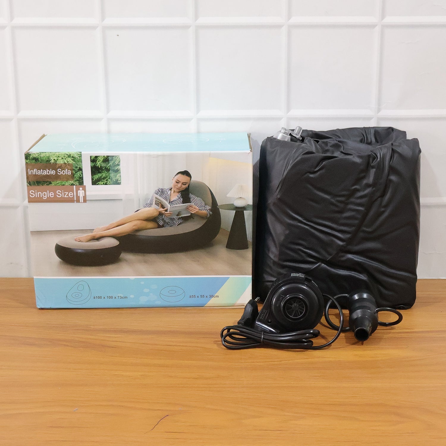 Portable inflatable sofa chair packed for travel