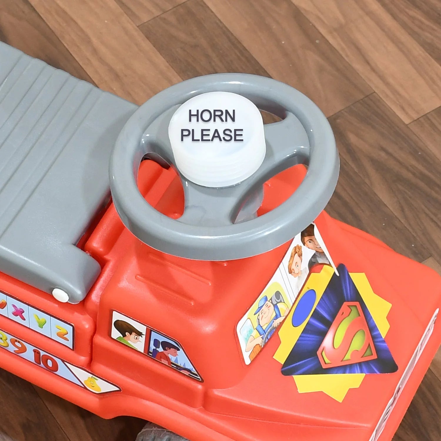 Ride-on toy truck with musical horn and backrest