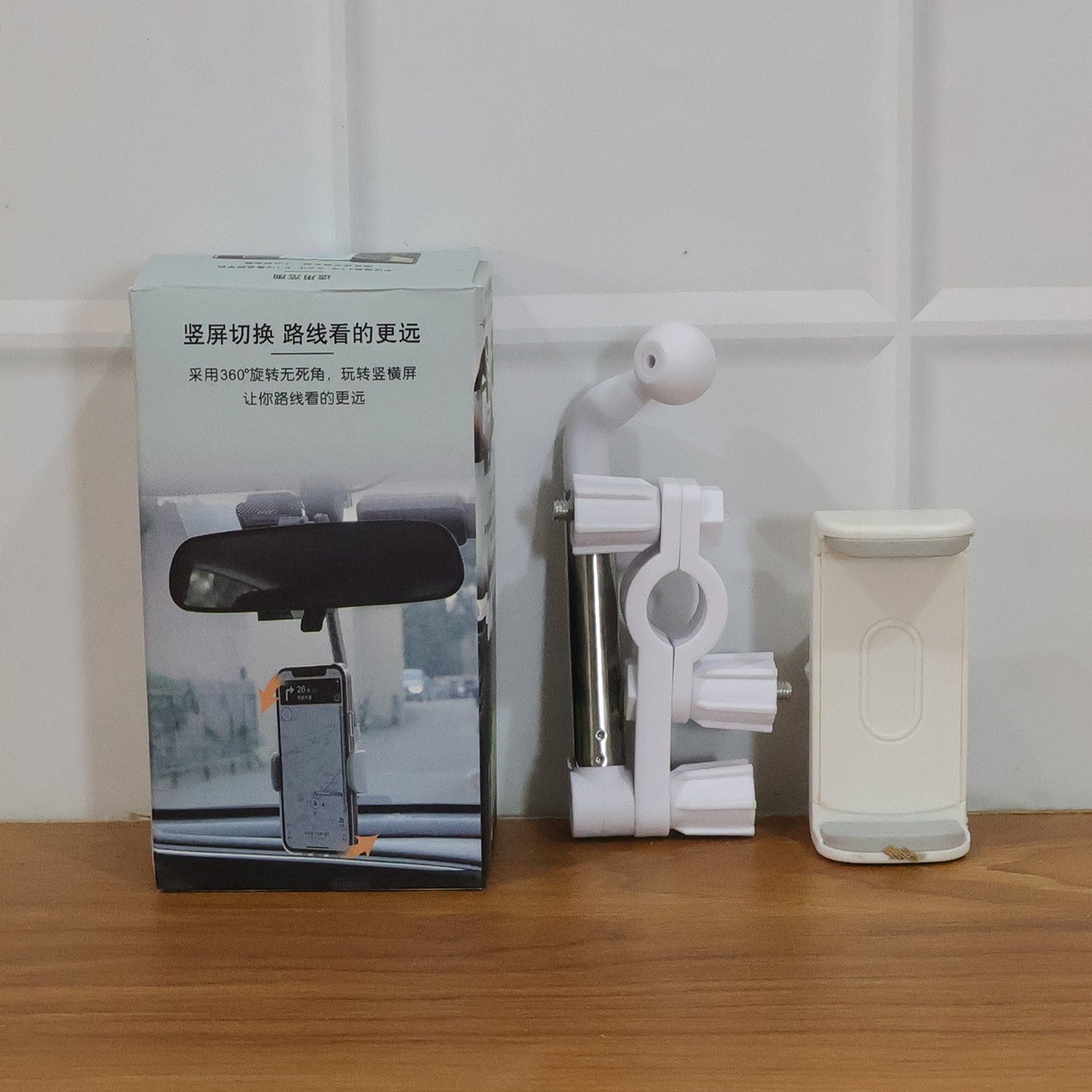 Rotating car phone holder showing 360 degree movement