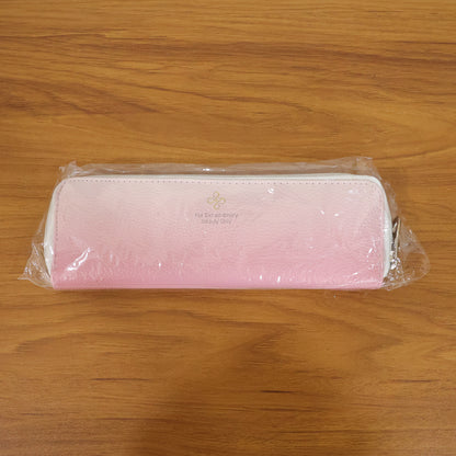Makeup brushes and cosmetic tools organized in pouch