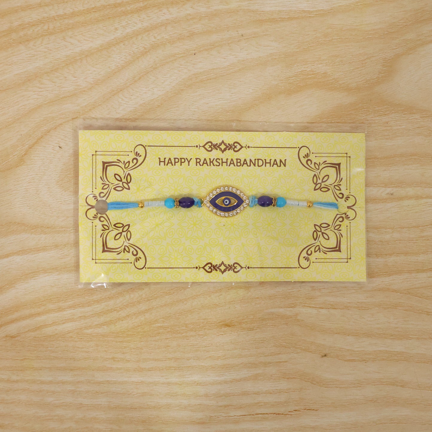Evil Eye Designer Rakhi with Blue Beads (1 Pc)