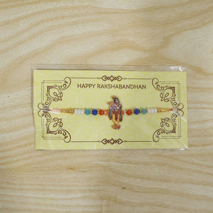 Spiritual Designer Rakhi with Lord Krishna Flute Playing Idol (1 Pc)