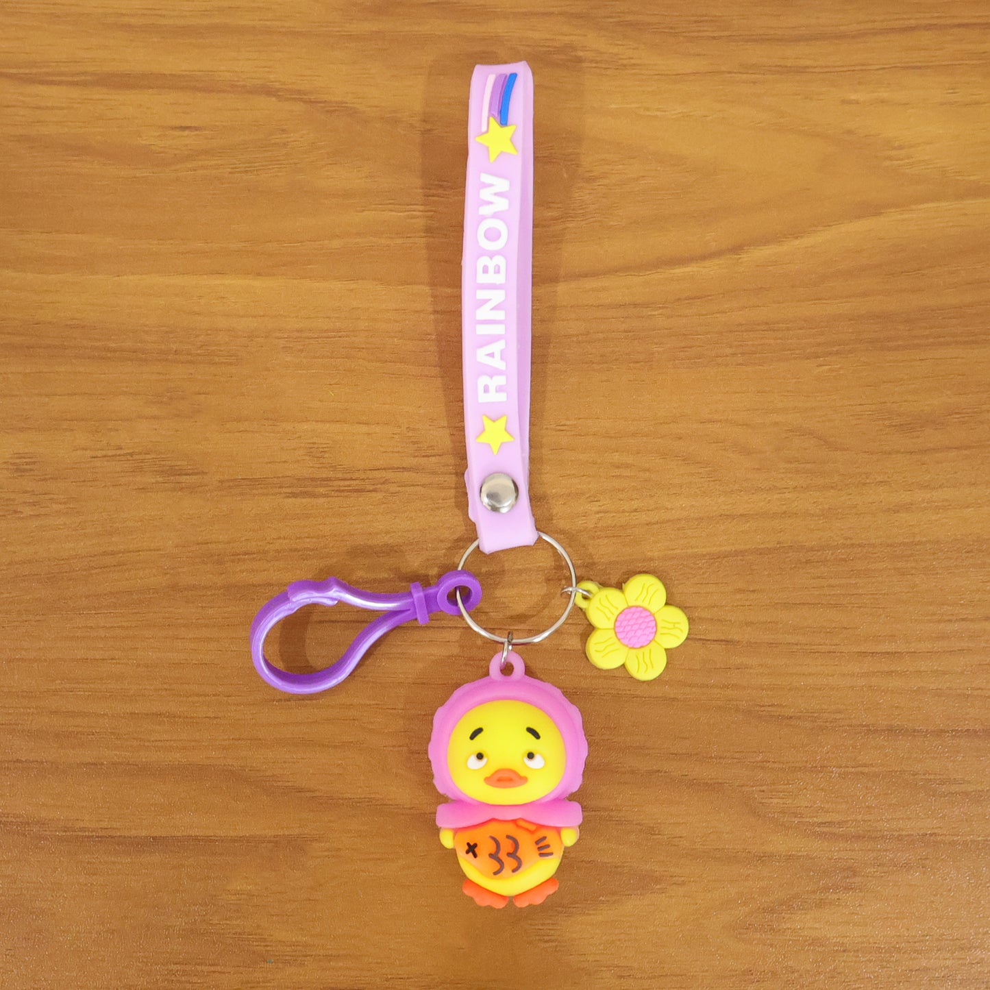 Back view of Cartoon Duck Keychain with rainbow strap