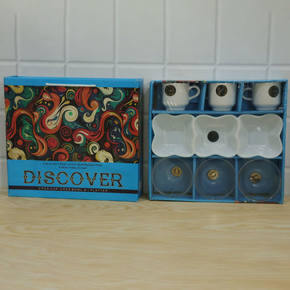 The blue gift box with its colorful lid is shown next to the open box, revealing the seven-piece serving set neatly